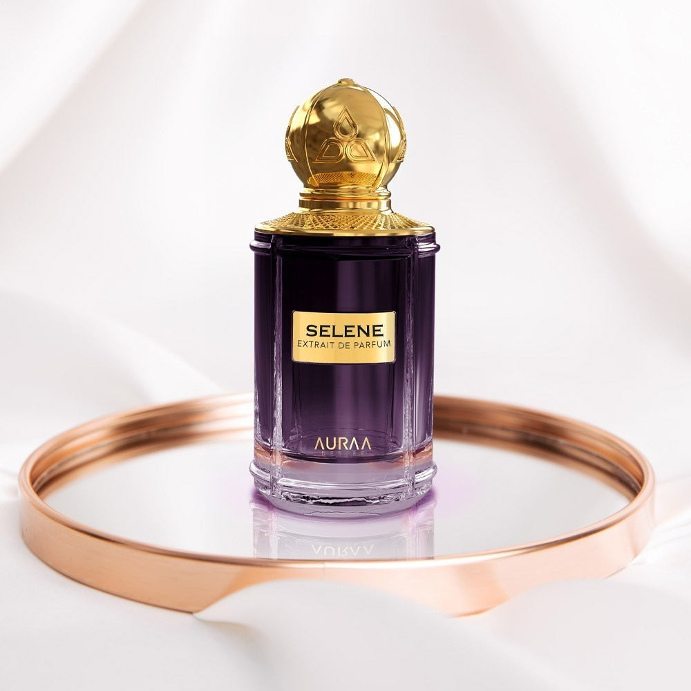 A purple perfume bottle by Savia Exclusive in a golden ring circle