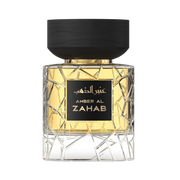 A transparent golden perfume bottle by Savia Exclusive with a black cap