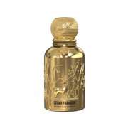 A golden perfume bottle by Savia Exclusive with white background