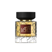 A golden perfume bottle from Nylaa by Savia Exclusive