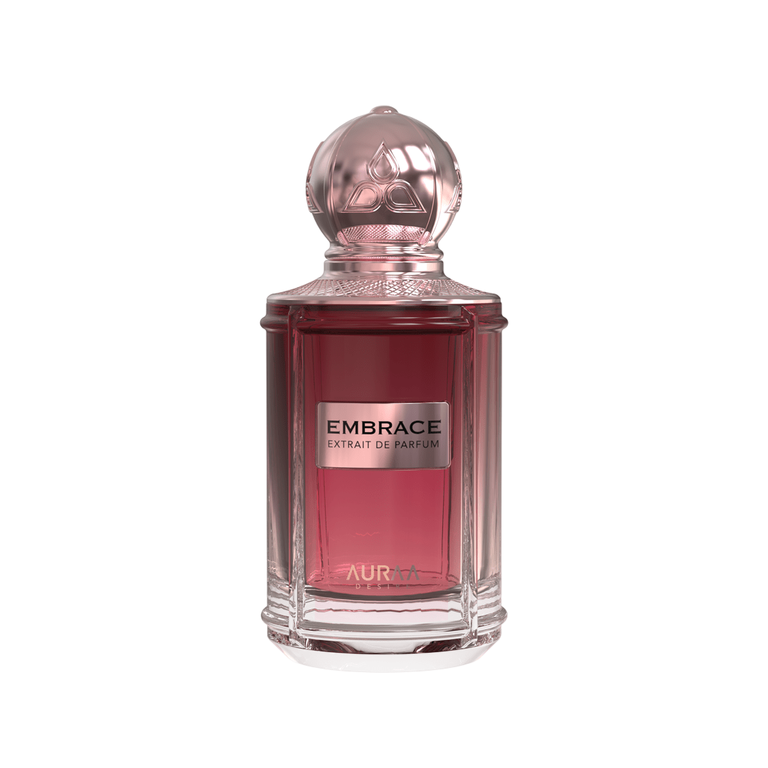 A maroon perfume bottle by Savia Exclusive with a golden cap & white background