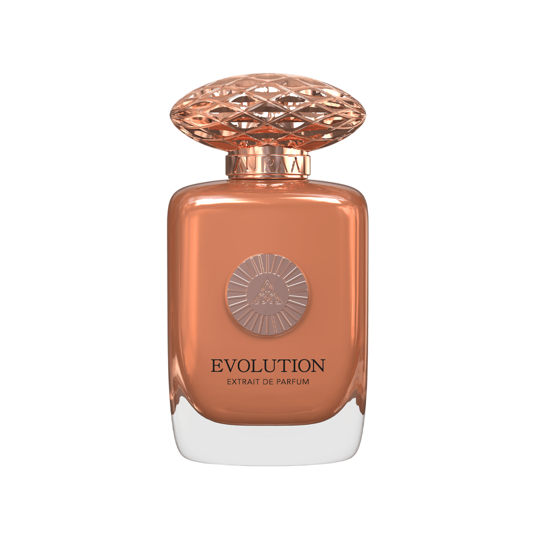 A peach & golden perfume bottle by Savia Exclusive with white background