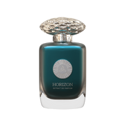 A blue perfume bottle with silver cap by Savia Exclusive & white background