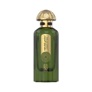 A green & golden perfume bottle by Savia Exclusive with white background