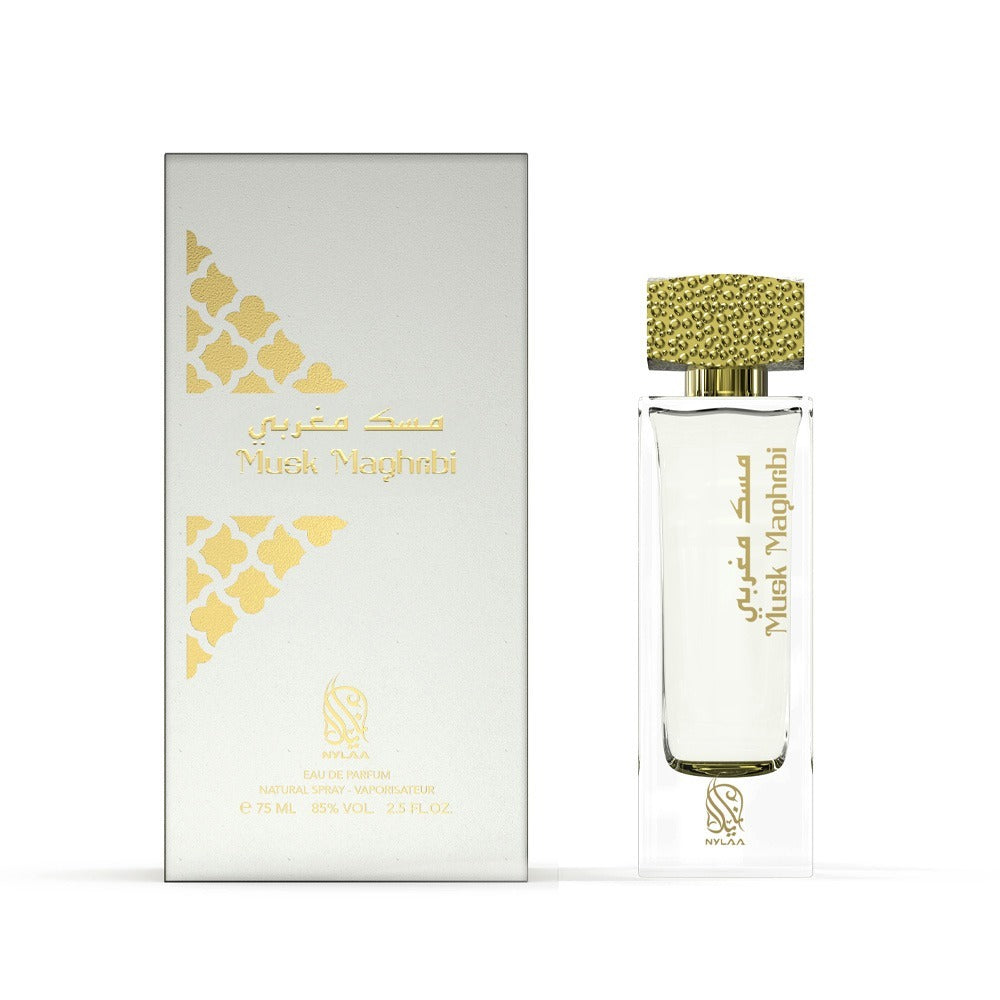 A transparent white perfume bottle with box from Nylaa by Savia Exclusive with a golden cap