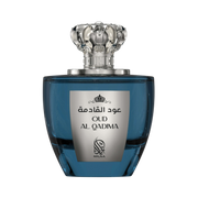 A blue perfume bottle with a silver cap by Savia Exclusive