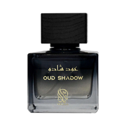 A grey & black perfume bottle by Savia Exclusive with a black cap