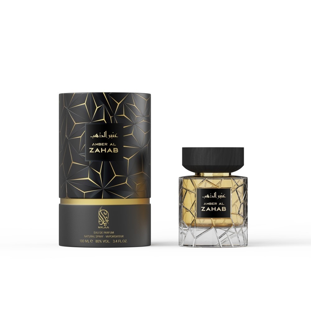 A transparent golden perfume bottle with box from Nylaa by Savia Exclusive with a black cap