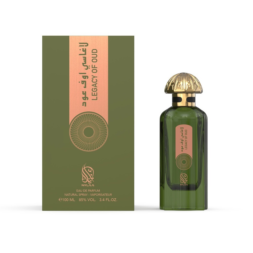 A green perfume bottle with box by Savia Exclusive with a golden cap