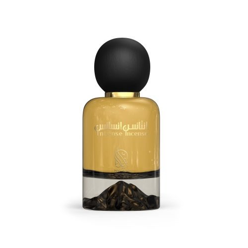 A golden perfume bottle with black round cap from Nylaa by Savia Exclusive