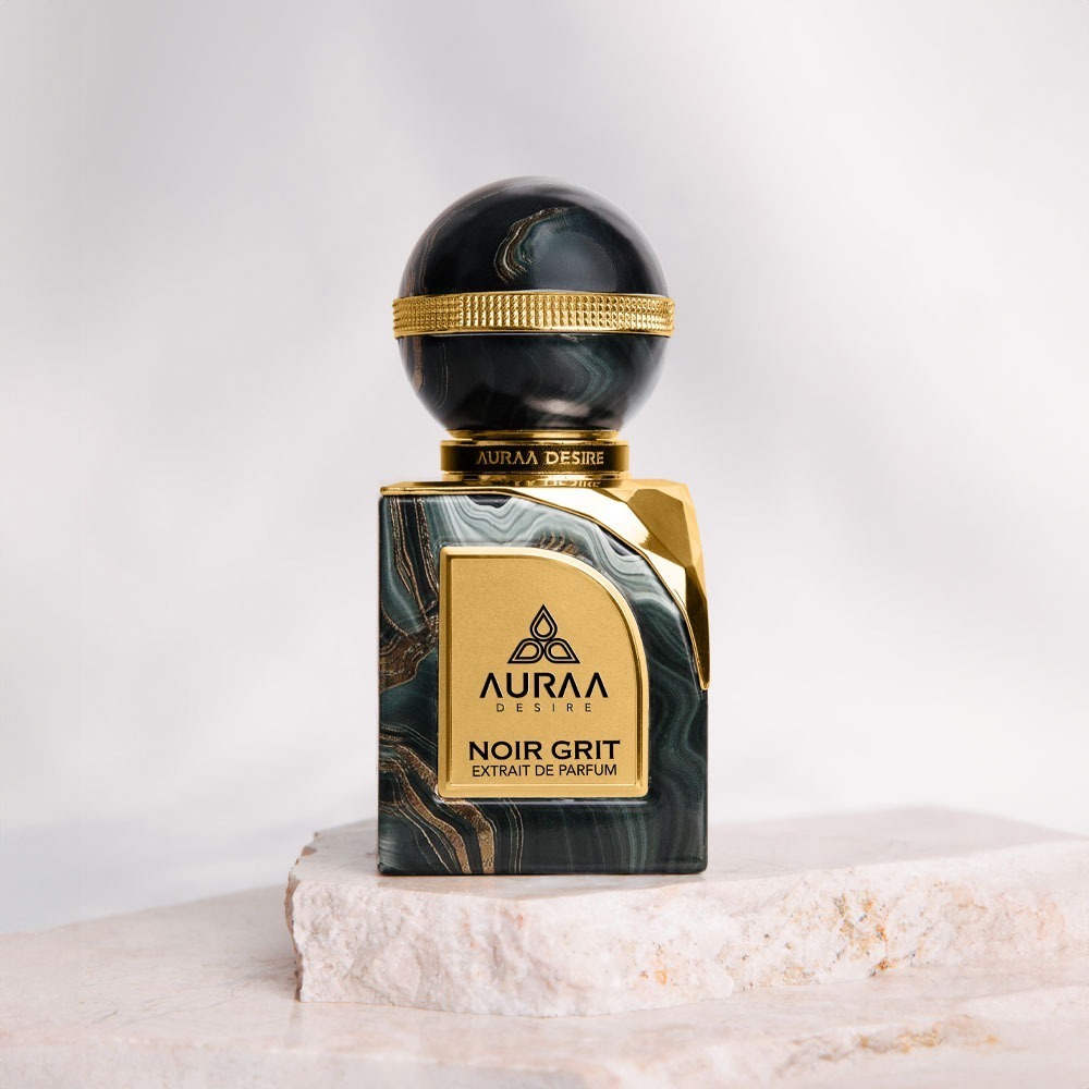 A black luxury perfume bottle from Auraa Desire by Savia Exclusive