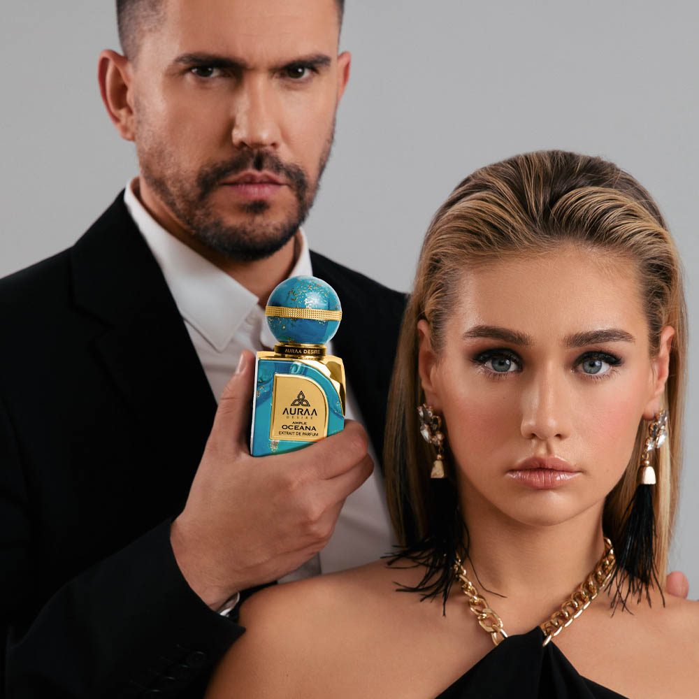 A man & a woman with an ocean inspired luxury perfume by Savia Exclusive