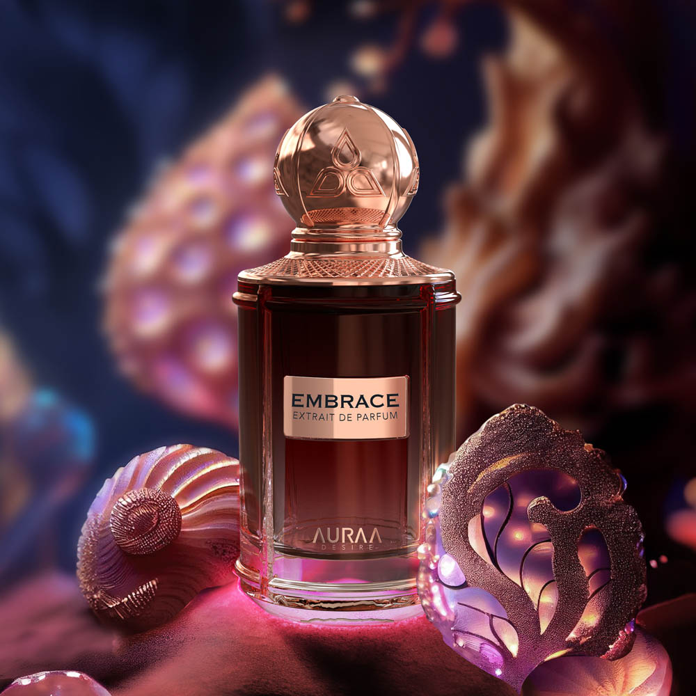 A brown luxury perfume bottle by Savia Exclusive with pearls