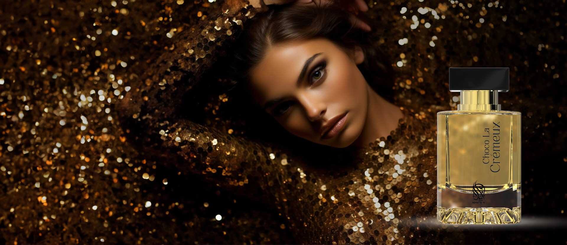 A woman wearing a glittery golden dress with perfume by Savia Exclusive